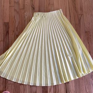 Yellow satin pleated skirt